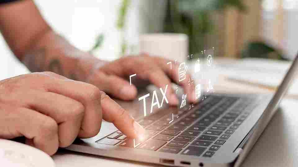 financial-research-government-taxes-calculation-tax-return-concept-businessman-using-laptop-fill-income-tax-online-return-form-payment